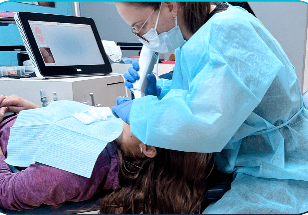 doctor checking teeth